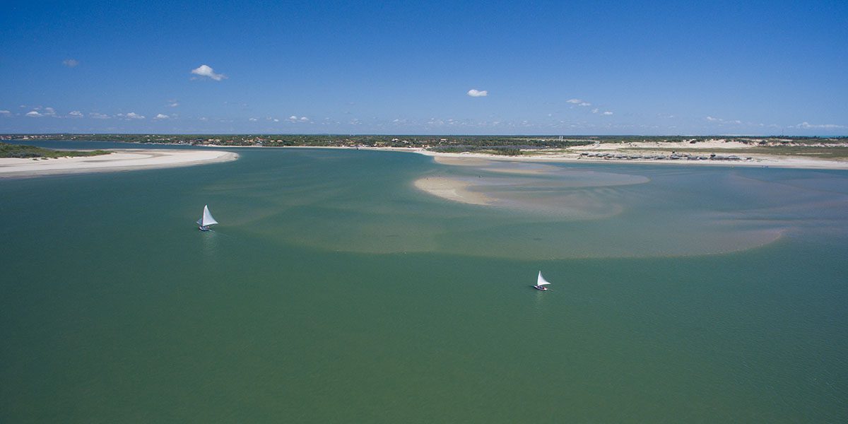 Um lugar onde você escolhe o mar ou o Rio para praticar seu esporte favorito.